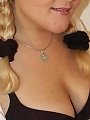 Chubby pigtail girl with freckles...