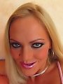 Sultry blonde wearing pink PVC gloves gets fucked in her butt