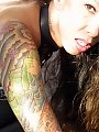 Tattoed and chained...