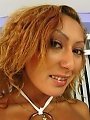 Exotic and busty babe stretches her pussy lips with big toy