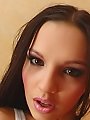 Brunette teen tries a big pink dildo and cucumber in her pussy