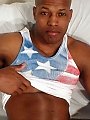 Sexy bald black man plays with his bulging love rod
