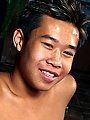 Asian twink strokes his erect shaft slowly...