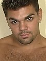 Gorgeous ethnic stud squeezes his thick cock