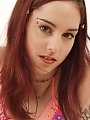 Redhead teen fingers her tight little slit...